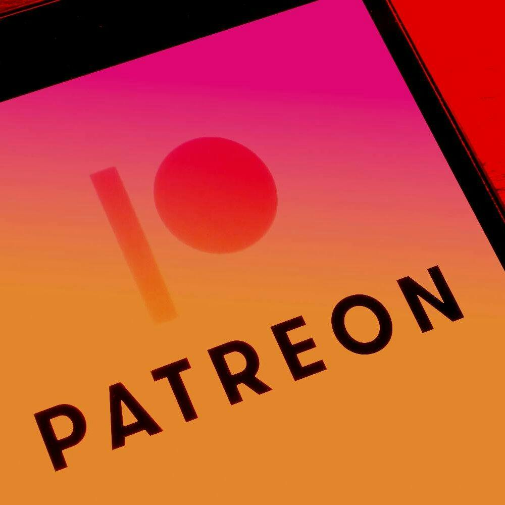 Phone with patreon app and cash on the side