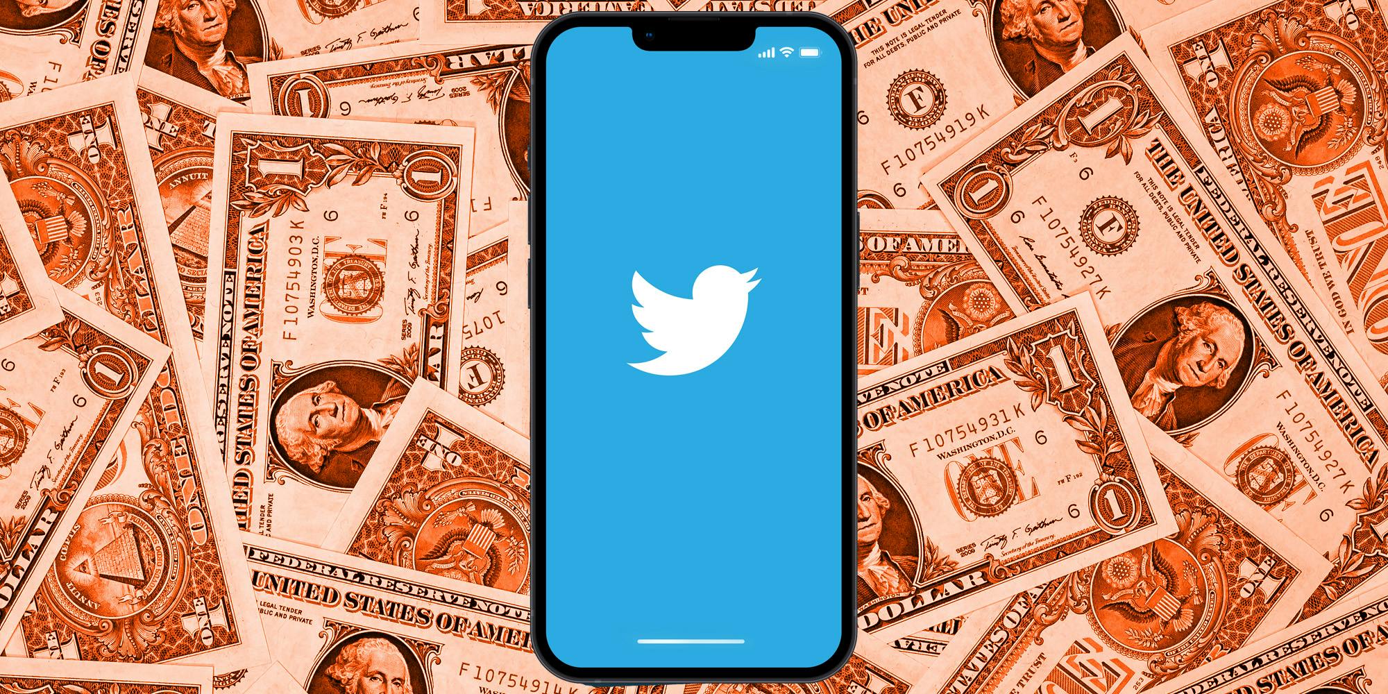 phone with twitter logo over background of dollar bills