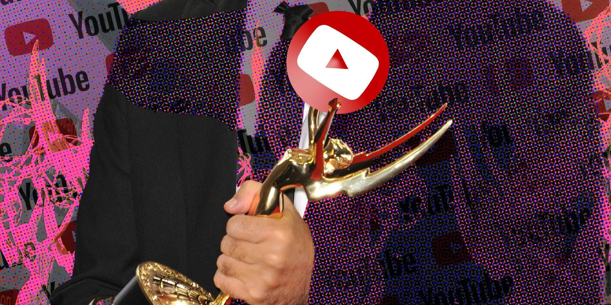 Hand holding emmy holding youtube play button on top of abstarct background with youtube logo